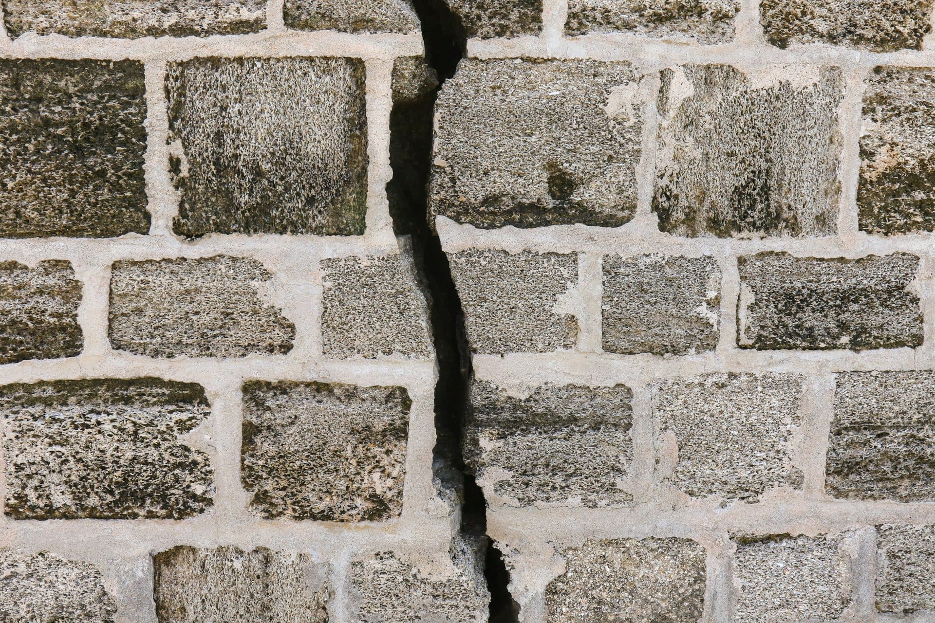 Crack running through a stone foundation wall